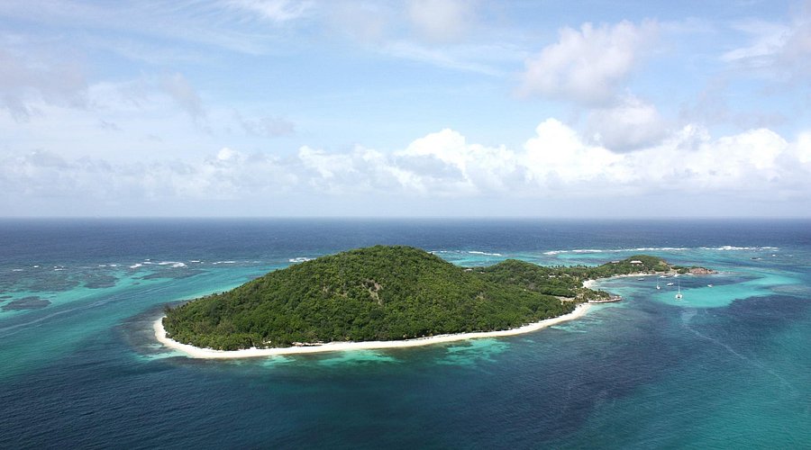 A lantern beside a coral path at Petit St. Vincent in the Grenadines